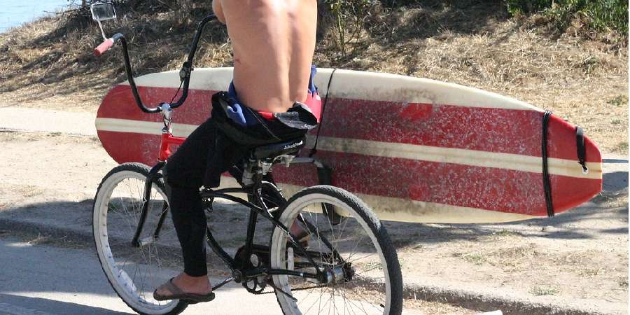 Advantages of Transporting a Surfboard by Bike